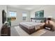 Spacious bedroom with large windows and plush carpet at 27512 Stellar Sea Way, Howey In The Hills, FL 34737
