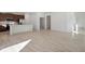 Open concept living room with tile flooring and natural light at 27512 Stellar Sea Way, Howey In The Hills, FL 34737