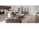 Virtually staged living room with dining area and hardwood floors at 27512 Stellar Sea Way, Howey In The Hills, FL 34737