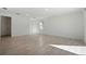 Spacious living area with tile flooring and lots of natural light at 27512 Stellar Sea Way, Howey In The Hills, FL 34737