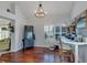 Bright home office with hardwood floors, large windows, and built-in workspace at 551 Cidermill Pl, Lake Mary, FL 32746