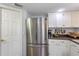 Modern kitchen with stainless steel appliances and plenty of storage space at 551 Cidermill Pl, Lake Mary, FL 32746