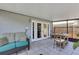 Covered patio with seating area and view of the backyard at 551 Cidermill Pl, Lake Mary, FL 32746