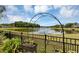 Scenic backyard view featuring a pond and lush greenery at 551 Cidermill Pl, Lake Mary, FL 32746