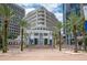 Orlando City Hall with palm trees and plaza at 108 S Glenwood Ave, Orlando, FL 32803