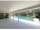 Inviting pool area with a covered patio and serene backyard view at 3235 Cross Fox Dr, Mulberry, FL 33860