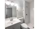 Updated bathroom with a shower and white vanity at 3235 Cross Fox Dr, Mulberry, FL 33860