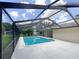 Refreshing pool with a screened enclosure at 3235 Cross Fox Dr, Mulberry, FL 33860