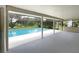 Inviting pool area with a covered patio and serene backyard view at 3235 Cross Fox Dr, Mulberry, FL 33860