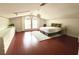 Spacious main bedroom with wood floors and large windows at 9060 Heritage Bay Cir, Orlando, FL 32836