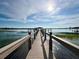 Private dock with gazebo overlooking calm water at 9060 Heritage Bay Cir, Orlando, FL 32836