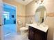 Clean bathroom with tile flooring, vanity, and toilet at 9060 Heritage Bay Cir, Orlando, FL 32836