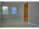 Bonus room with tile floors and access to another room at 647 S Delaware Ave, Deland, FL 32720