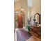 Elegant entryway with hardwood floors, a large wooden door, and a statement chandelier at 1750 Taylor Woods Rd, Deland, FL 32724