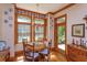 Charming breakfast nook with wood table and chairs, and access to backyard at 1750 Taylor Woods Rd, Deland, FL 32724