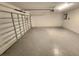 Attached garage with overhead door and ample space for parking and storage at 2220 Church St, Sanford, FL 32771