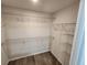 Walk-in closet with wire shelving for convenient storage at 2220 Church St, Sanford, FL 32771