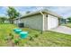 House exterior showcasing the side yard and garage at 2261 Greenway St, Sanford, FL 32771