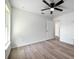 Bright bedroom with large window and ceiling fan at 2261 Greenway St, Sanford, FL 32771