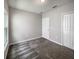 Bright bedroom featuring a large window and neutral wall colors at 6931 Wilson Pasture Ave, Groveland, FL 34736