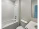 Clean bathroom with a bathtub and a vanity at 6931 Wilson Pasture Ave, Groveland, FL 34736