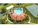 Aerial view of community pool, tennis courts, playground, and basketball court at 1361 Whitney Isles Dr, Windermere, FL 34786