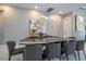 Elegant dining room with a large marble table and modern chandelier at 1361 Whitney Isles Dr, Windermere, FL 34786