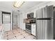 Well-equipped kitchen with stainless steel appliances and granite counters at 3502 Windy Walk Way # 2104, Orlando, FL 32837