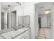 Bathroom with granite countertop and view of hallway at 3502 Windy Walk Way # 2104, Orlando, FL 32837
