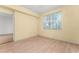 Spacious bedroom with laminate flooring and a large window at 3502 Windy Walk Way # 2104, Orlando, FL 32837