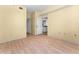 Bright living room with laminate flooring and access to other rooms at 3502 Windy Walk Way # 2104, Orlando, FL 32837