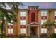 Attractive building exterior with stairs and landscaping at 3502 Windy Walk Way # 2104, Orlando, FL 32837