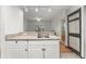 Kitchen with granite countertops and breakfast bar at 3502 Windy Walk Way # 2104, Orlando, FL 32837