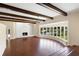 Living room with hardwood floors, fireplace and water views at 201 Tranquility Cv, Altamonte Springs, FL 32701