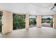 Spacious balcony overlooking a lake and lush trees at 201 Tranquility Cv, Altamonte Springs, FL 32701