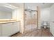 Modern bathroom with a large walk-in shower and granite countertop at 201 Tranquility Cv, Altamonte Springs, FL 32701