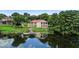 Waterfront home with private dock and lush landscaping at 201 Tranquility Cv, Altamonte Springs, FL 32701