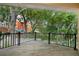 Private balcony overlooking lush trees and neighboring buildings at 201 Tranquility Cv, Altamonte Springs, FL 32701