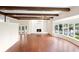 Spacious living room with hardwood floors, fireplace and large windows at 201 Tranquility Cv, Altamonte Springs, FL 32701