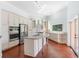 Modern kitchen with granite island, stainless steel appliances, and light cabinets at 201 Tranquility Cv, Altamonte Springs, FL 32701