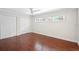 Spacious bedroom with hardwood floors and double closets at 201 Tranquility Cv, Altamonte Springs, FL 32701