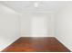 Simple bedroom with hardwood floors at 201 Tranquility Cv, Altamonte Springs, FL 32701