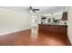 Open dining area with hardwood floors and kitchen views at 201 Tranquility Cv, Altamonte Springs, FL 32701