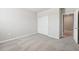 Spacious bedroom with carpet flooring and a double-door closet at 1717 Forest Run Ln, Auburndale, FL 33823