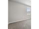 Bright bedroom with grey carpet and neutral walls at 1717 Forest Run Ln, Auburndale, FL 33823