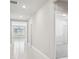Bright hallway with tile flooring leading to other rooms at 1717 Forest Run Ln, Auburndale, FL 33823
