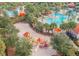 Aerial view of resort-style pool and playground at 5299 Wildwood Way, Davenport, FL 33837