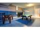 Fun game room with pool table and foosball table at 5299 Wildwood Way, Davenport, FL 33837