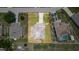 Two-story house with a large backyard and covered patio at 1233 Nelson Park Court, Poinciana, FL 34759