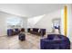 Spacious living room featuring a large sectional sofa and ample natural light at 1233 Nelson Park Court, Poinciana, FL 34759